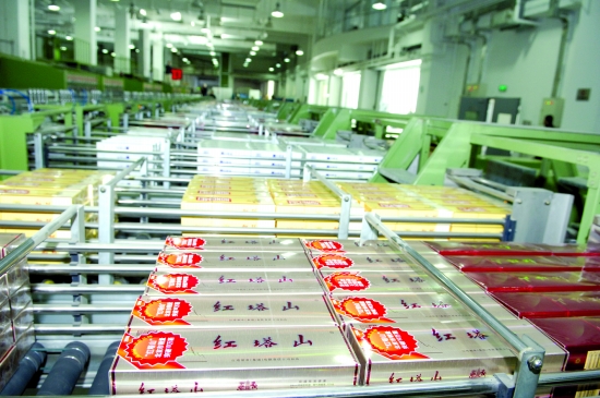 浅谈自动分拣输送机输送物料过程